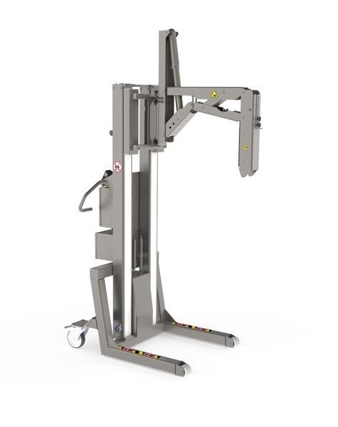 This vertical lift for clean room use is equipped with an electrically operated roll lifting tool with inner grip. This tool allows for both turning and tipping the roll.