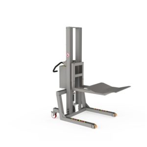 Attached to this industrial material handling machinery is a roll handler tool in the form of a large V-block for very heavy rolls.