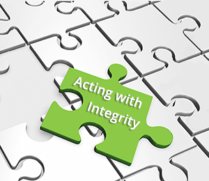 2Lift's code of conduct. Picture of a piece of a jigsaw puzzle with the text "Acting with integrity" written on it. 