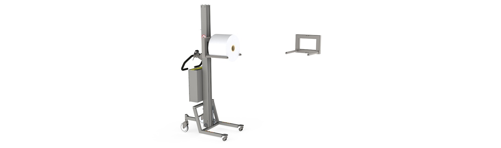 The double mandrel (DM) is a foil or paper handling tool. Image: A material handling lift handling a roll of paper.